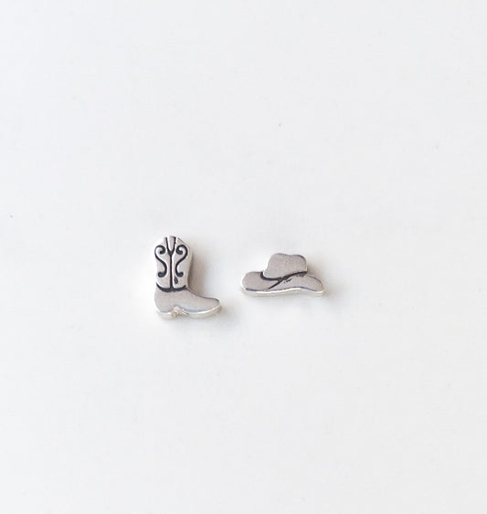 Sterling silver mismatched cowboy hat and boot stud earrings with polished finish, displayed on neutral background – Western jewelry gift for her.