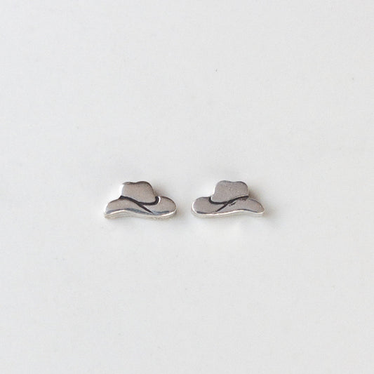 Sterling silver cowboy hat stud earrings displayed on neutral background – Western faith-inspired jewelry for women.
