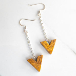 Sagely Sparrow Yellow Jasper Earrings on white background with gray marbling