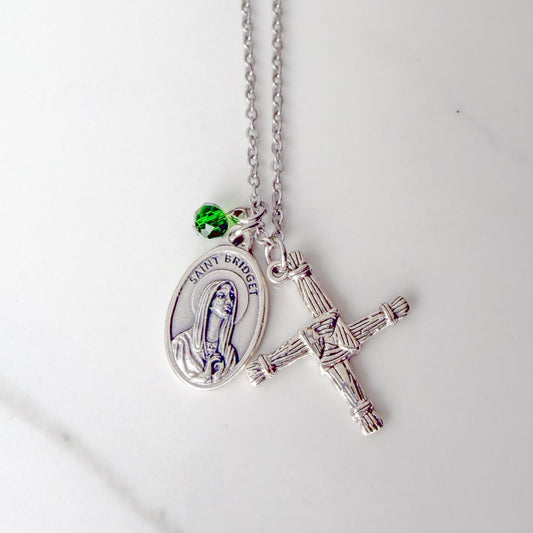 St Brigid necklace with Saint Brigid medal, St Brigid’s Cross charm, and green bead on silver stainless steel chain