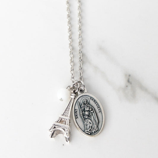 St. Genevieve patron saint necklace with silver Saint Genevieve medal, 3D Eiffel Tower charm, and white bead on stainless steel chain, Catholic saint jewelry gift