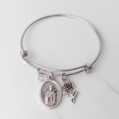 St. Therese of Lisieux stainless steel bracelet for girls, Catholic Confirmation gift with saint medal charm, silver rose charm and pink bead on bangle