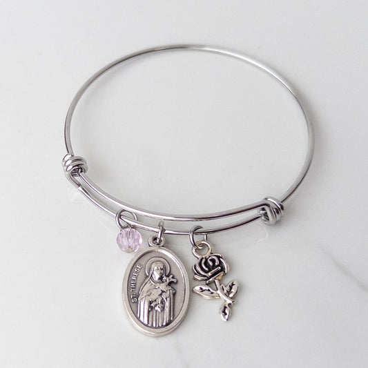 St. Therese of Lisieux stainless steel bracelet for girls, Catholic Confirmation gift with saint medal charm, silver rose charm and pink bead on bangle