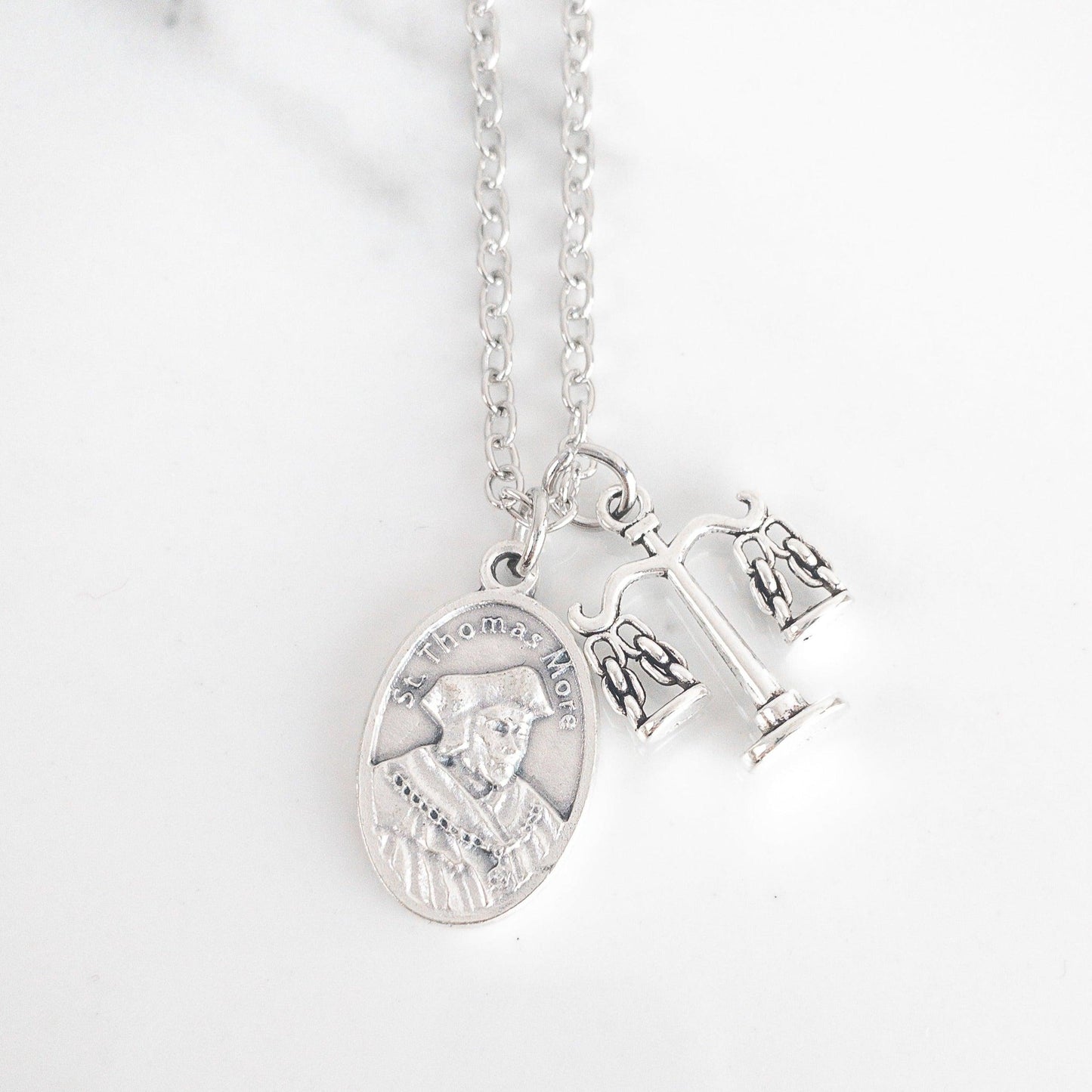 St Thomas More necklace with Italian saint medal and scales of justice charm on stainless steel chain